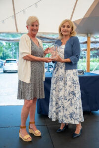 Mercy Center Executive Director Kim Guadagno (right) presents the Community Partner Award to Friends the Spring Lake 5 representative Cindy Lustrino